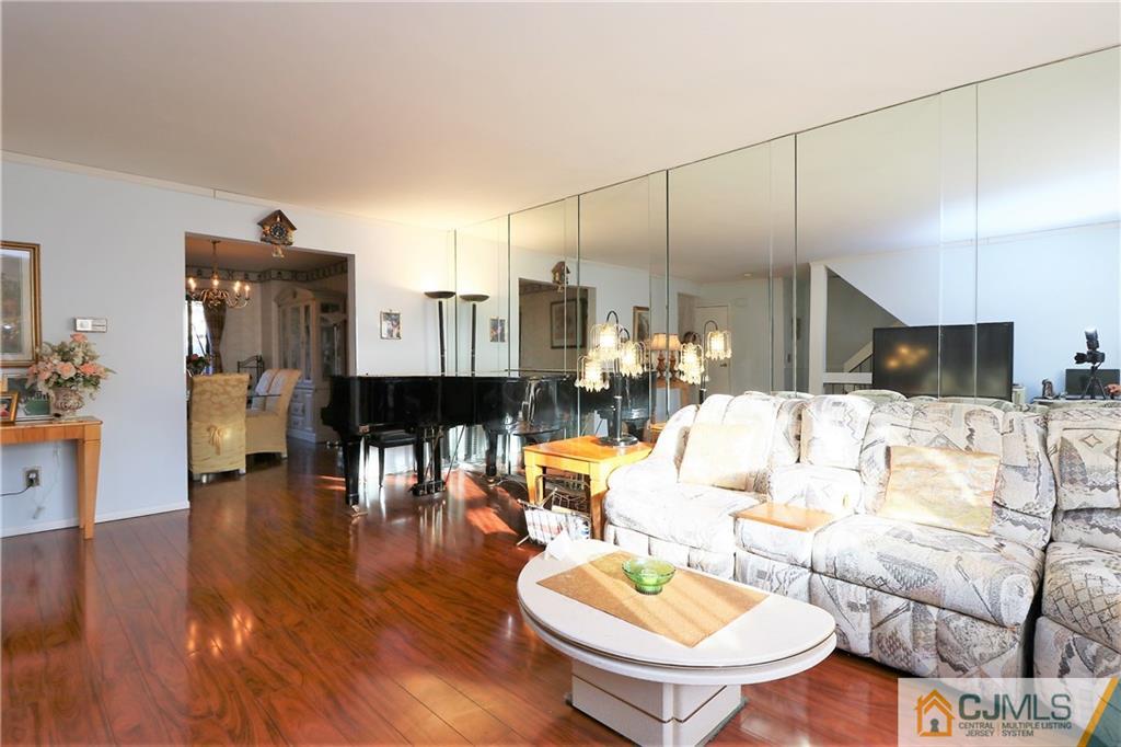 6801 Hana Road Edison, NJ 08817 - Photo 3 of 24 a living room with furniture and wooden floor