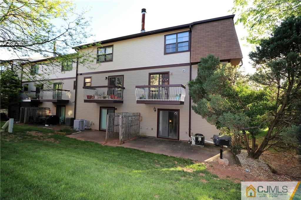 6801 Hana Road Edison, NJ 08817 - Photo 22 of 24 a view of a house with a yard and sitting area