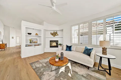 a bedroom with bed and a window