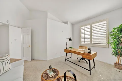 a utility room with sink dryer and washer