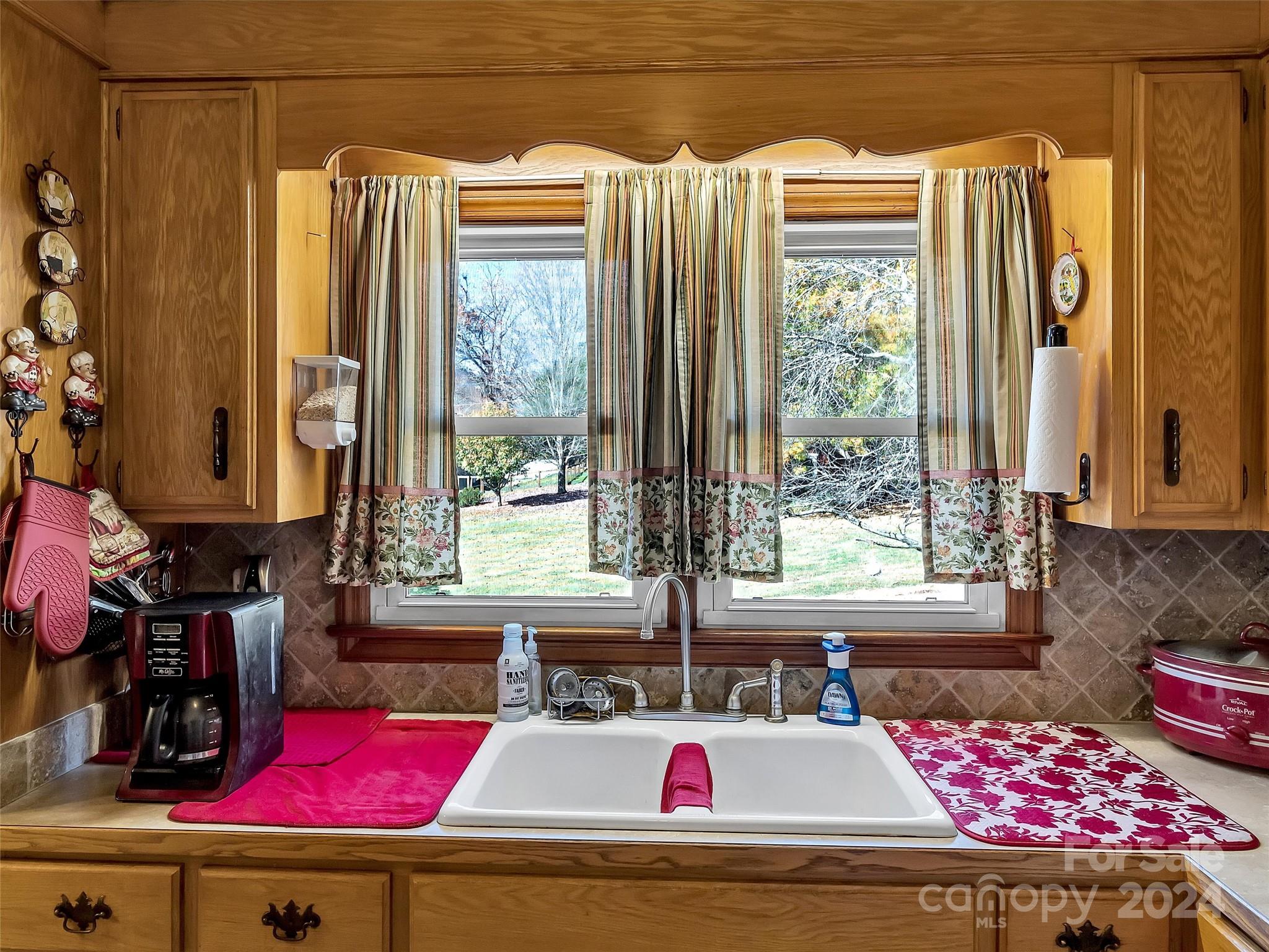 53 Osborne Ridge Road Canton, NC 28716 - Photo 8 of 27 a kitchen with a window and cabinets