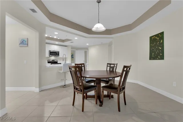 a view of a dining room with furniture