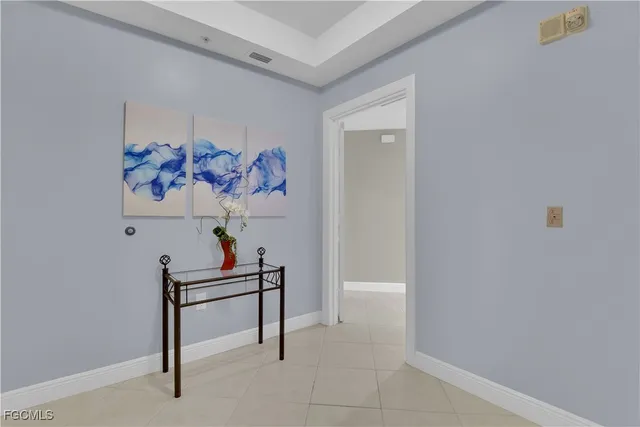 a view of a hallway with a workspace