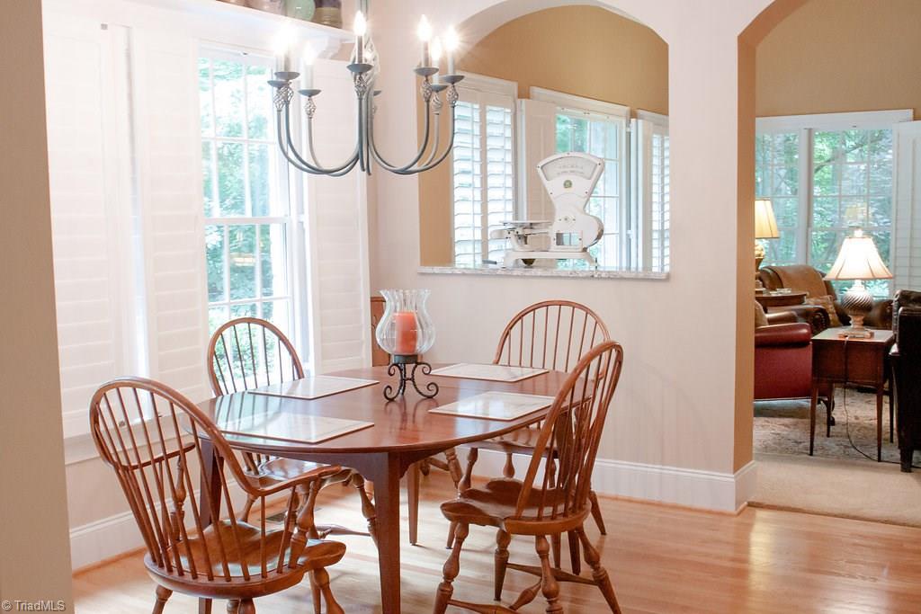 4109 Rockingham Road South Greensboro, NC 27407 - Photo 7 of 27 Breakfast area, sunny and bright!