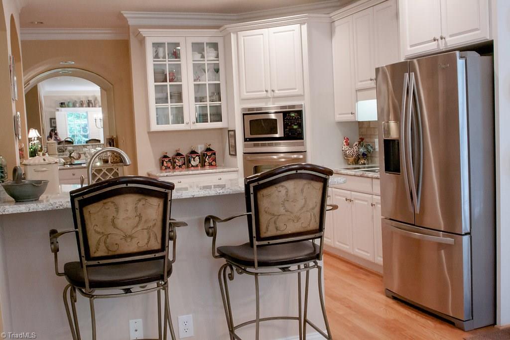 4109 Rockingham Road South Greensboro, NC 27407 - Photo 10 of 27 Entertaining large crowds has never been easier with counter and table seating!
