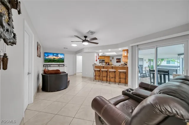 a living room filled with furniture and furniture
