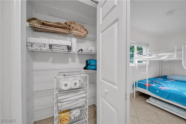 a kitchen with a cabinets and wooden floor