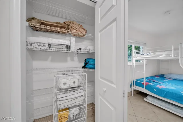 a kitchen with a cabinets and wooden floor