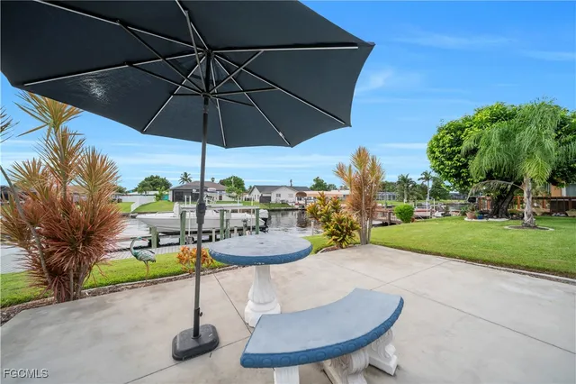 a view of a balcony with wooden floor and city view
