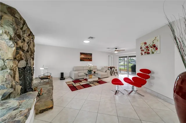 a living room with furniture and a couch