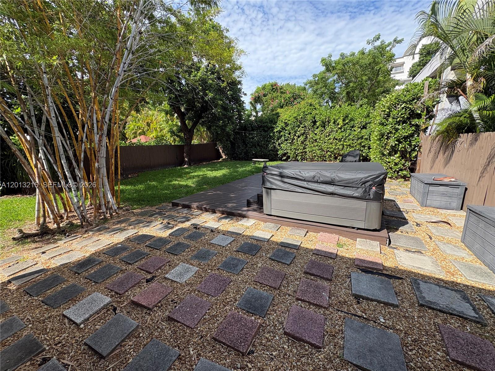 250 Southwest 19th Road Miami, FL 33129 - Photo 16 of 22 a view of a backyard with sitting area