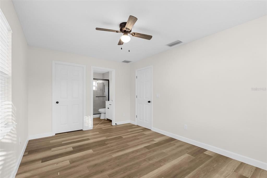 1507 Constantine Street Orlando, FL 32825 - Photo 18 of 27 a view of empty room with wooden floor