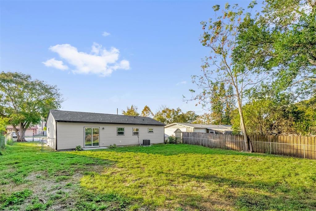 1507 Constantine Street Orlando, FL 32825 - Photo 21 of 27 a view of a house with backyard and garden