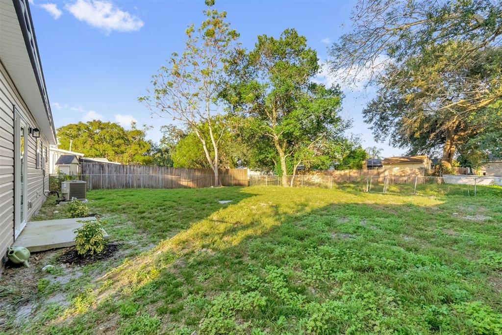 1507 Constantine Street Orlando, FL 32825 - Photo 22 of 27 a view of yard with green space