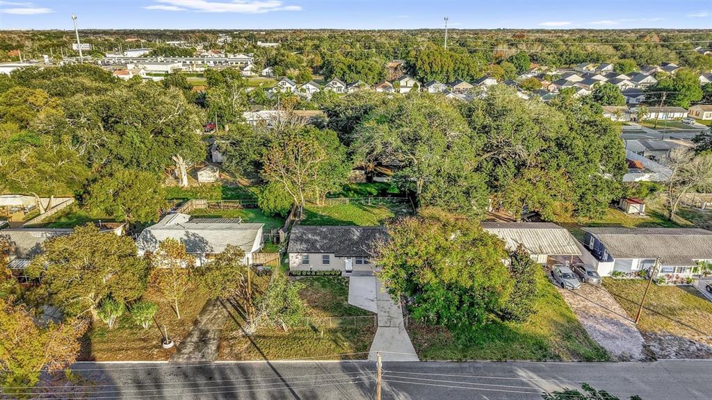 1507 Constantine Street Orlando, FL 32825 - Photo 23 of 27 a view of a yard with an outdoor space