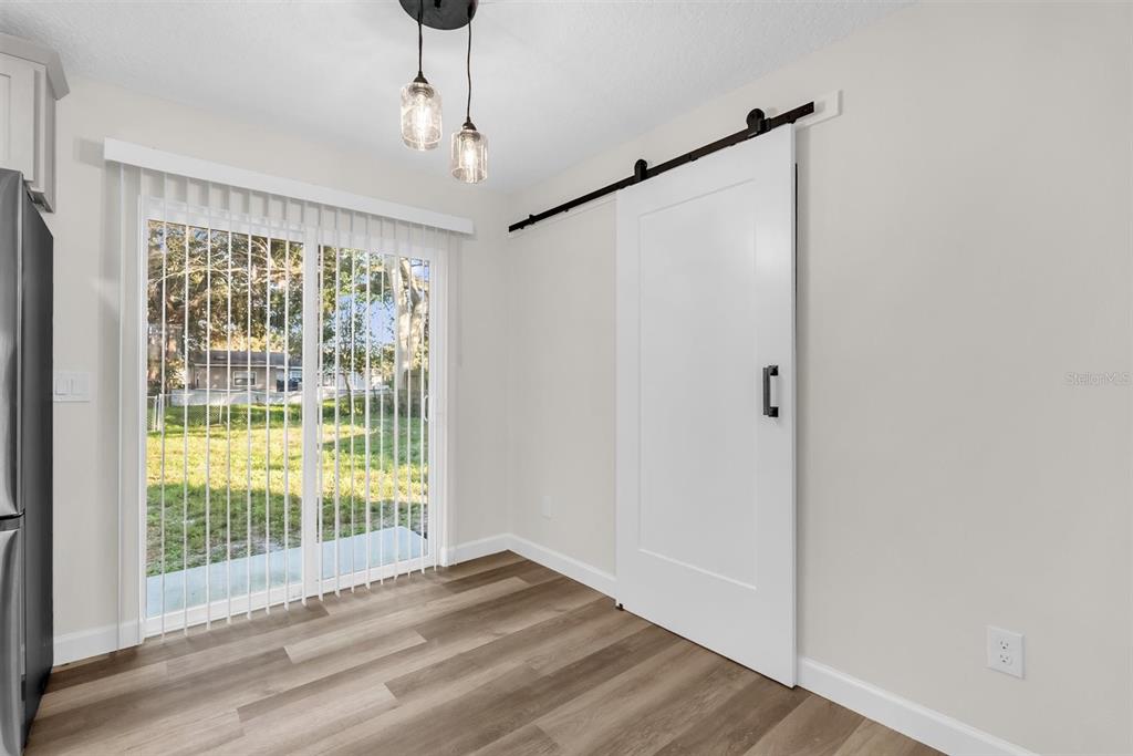 1507 Constantine Street Orlando, FL 32825 - Photo 10 of 27 a view of empty room with wooden floor and fan