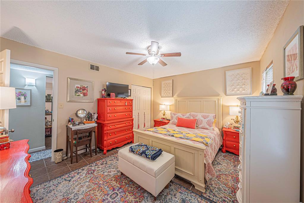 2418 Northeast 7th Street, Unit 6 Ocala, FL 34470 - Photo 17 of 33 a living room with furniture and wooden floor