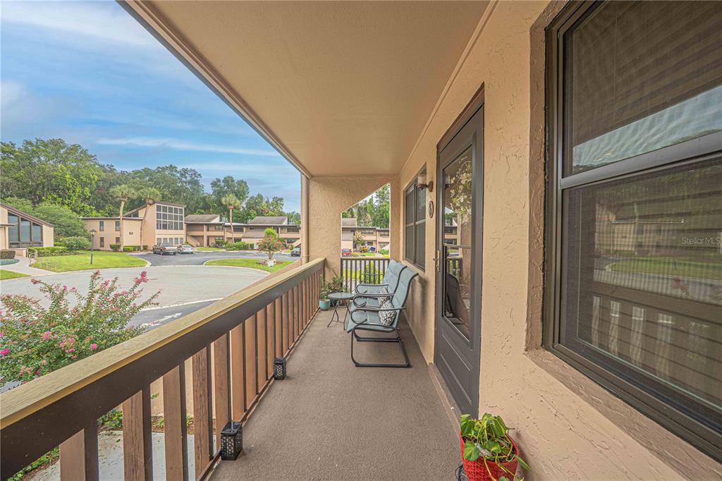 2418 Northeast 7th Street, Unit 6 Ocala, FL 34470 - Photo 27 of 39 a view of a city from a balcony