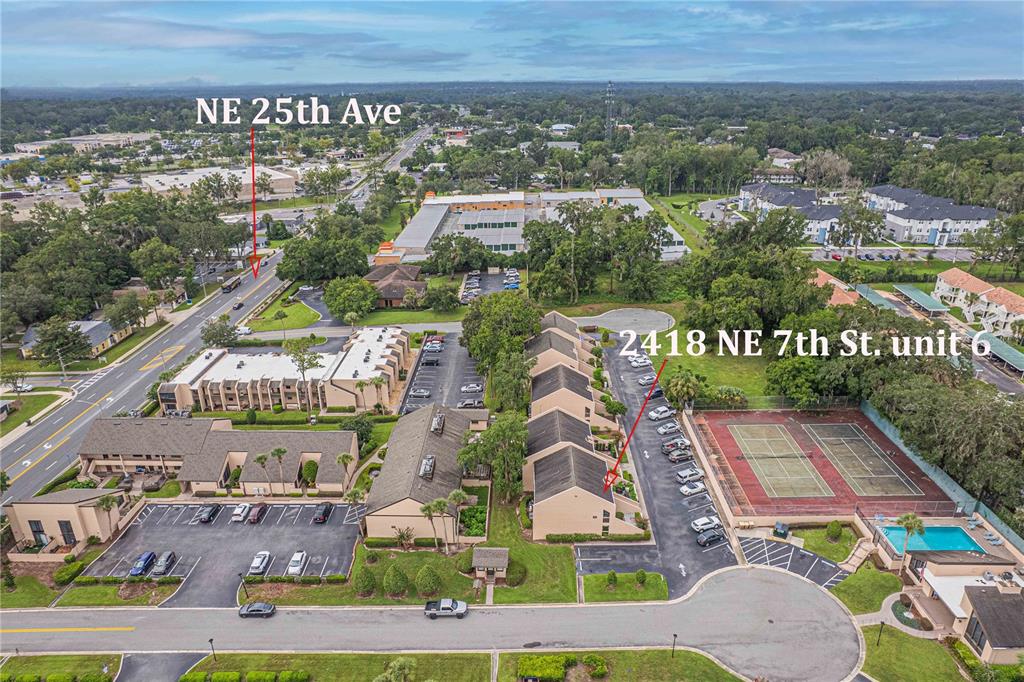 2418 Northeast 7th Street, Unit 6 Ocala, FL 34470 - Photo 27 of 33 an aerial view of a house with a garden