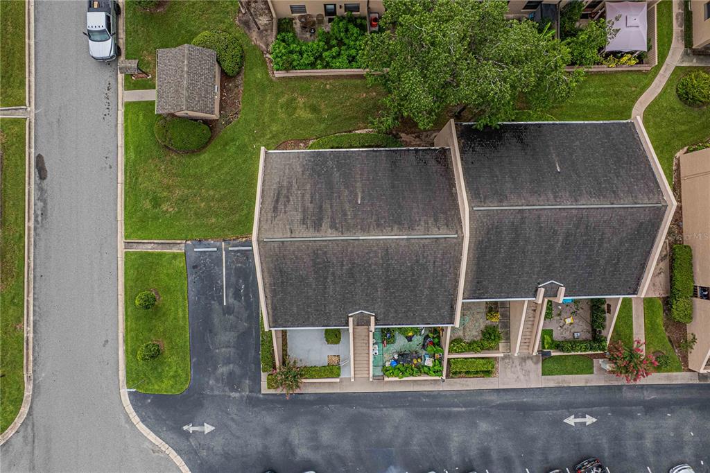 2418 Northeast 7th Street, Unit 6 Ocala, FL 34470 - Photo 29 of 33 an aerial view of a house with garden