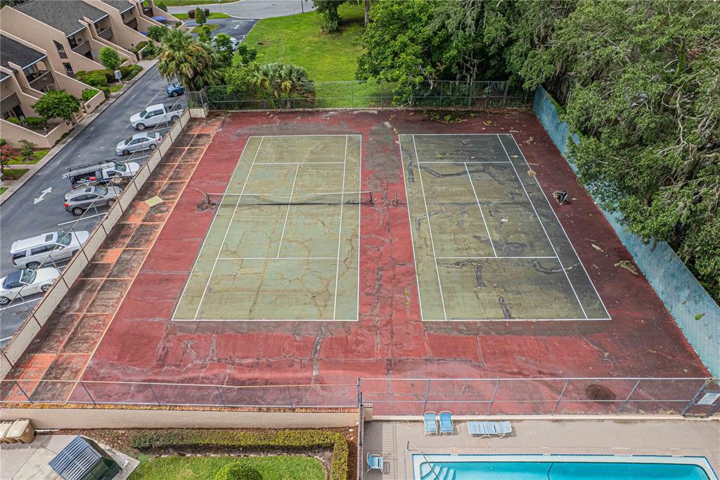 2418 Northeast 7th Street, Unit 6 Ocala, FL 34470 - Photo 31 of 33 a view of a backyard