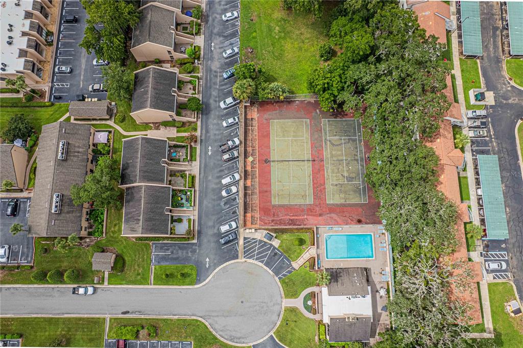 2418 Northeast 7th Street, Unit 6 Ocala, FL 34470 - Photo 38 of 39 front view of a house with a yard