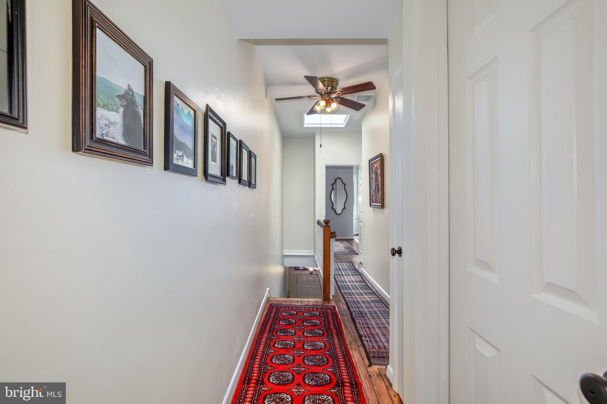 804 A Street Northeast Washington, DC 20002 - Photo 11 of 25 a view of a hallway with wooden floor and staircase