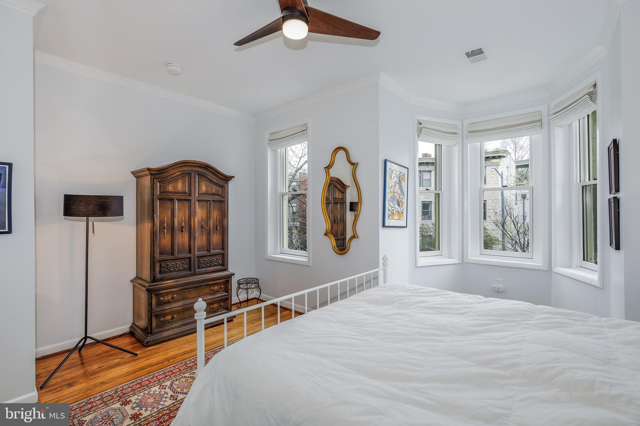 804 A Street Northeast Washington, DC 20002 - Photo 13 of 25 a bedroom with a bed dresser and a window