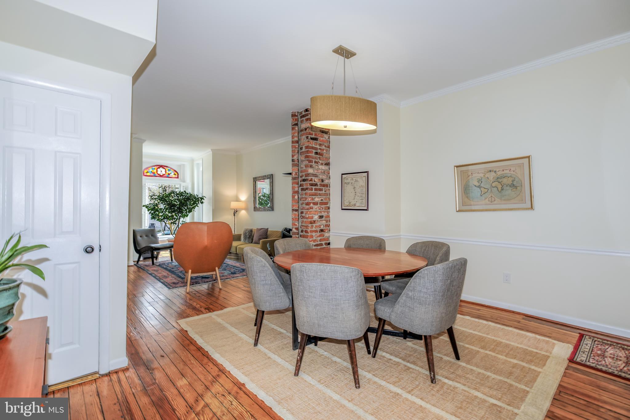 804 A Street Northeast Washington, DC 20002 - Photo 5 of 25 a dining room with furniture and wooden floor