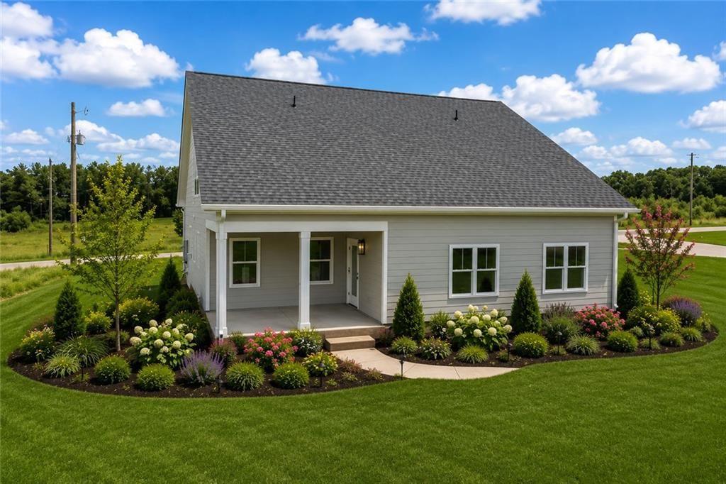 693 Racetrack Road Toccoa, GA 30577 - Photo 2 of 45 a front view of a house with a garden
