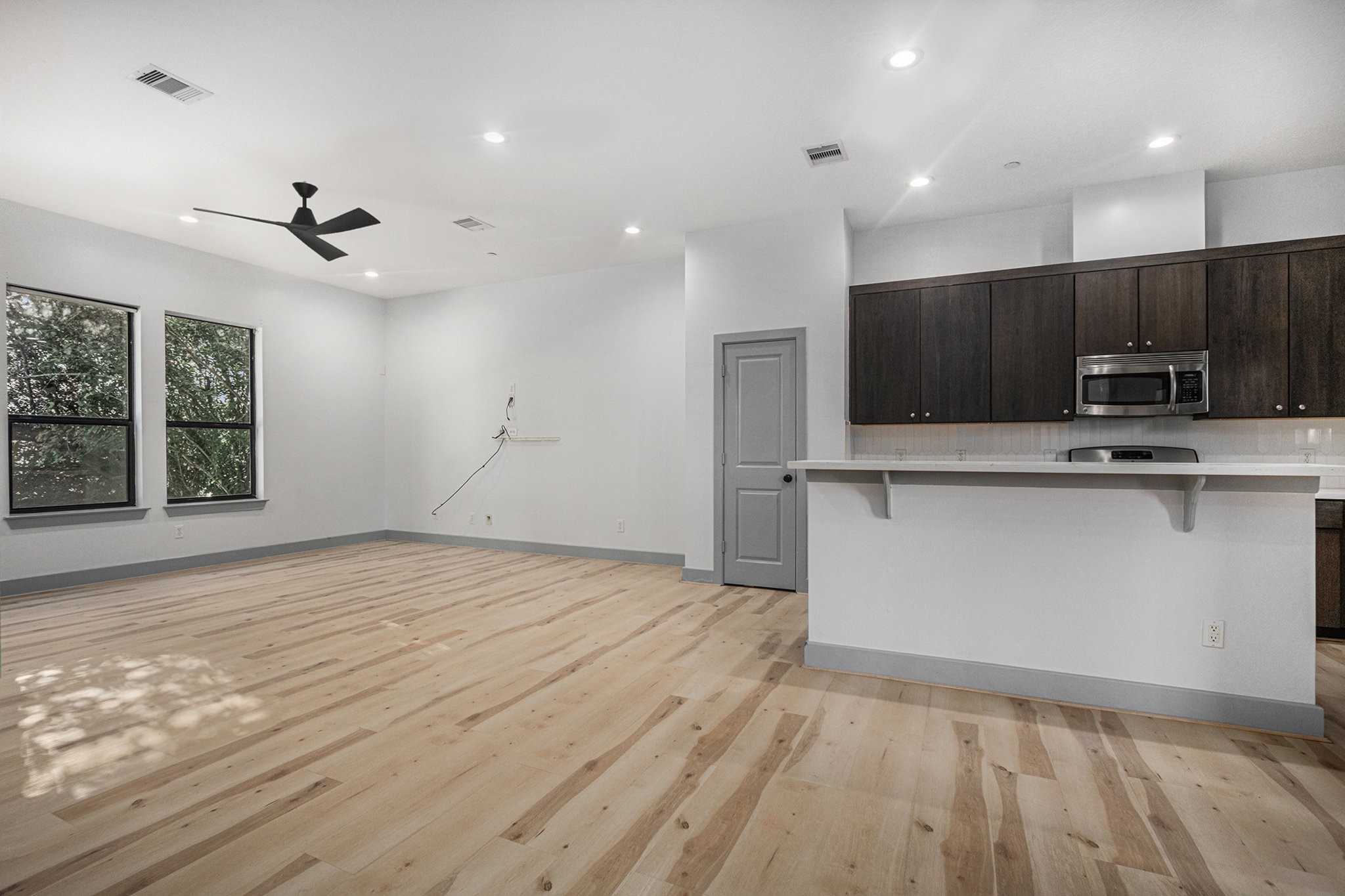2422 Navigation Boulevard, Unit G Houston, TX 77003 - Photo 3 of 16 a view of a kitchen with a sink and a stove top oven