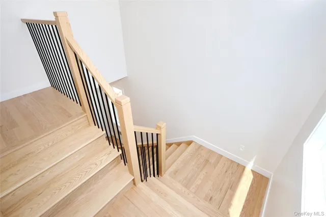 a view of entryway with wooden floor