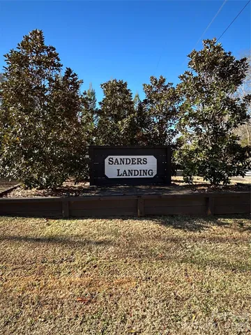 a view of a city with lush green forest