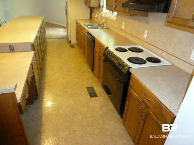 9660 Gayfer Rd Extension Fairhope, AL 36532 - Photo 12 of 38 LAUNDRY ROOM