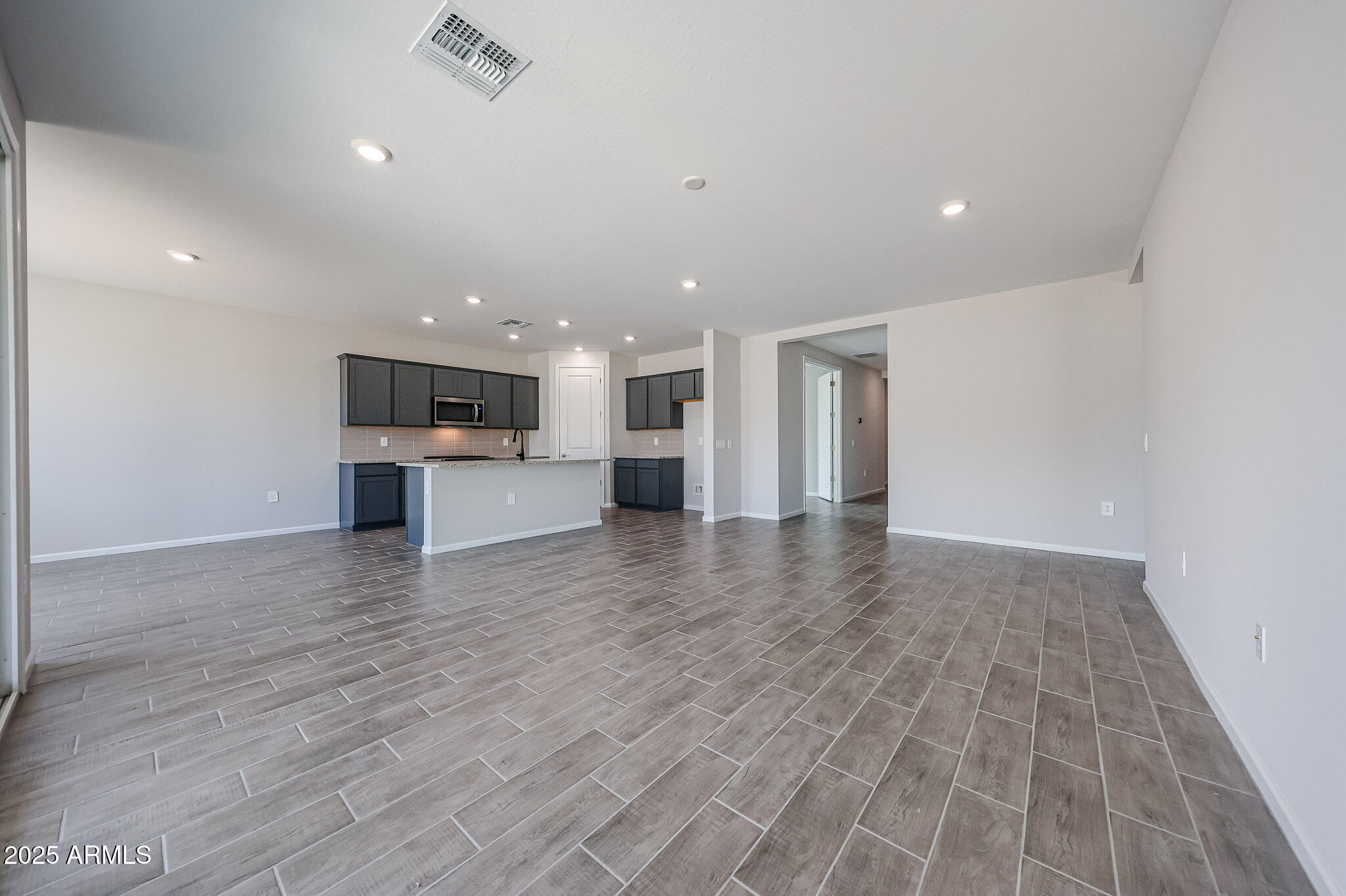 17867 West Fulton Street Goodyear, AZ 85338 - Photo 12 of 40 a view of kitchen with sink and refrigerator