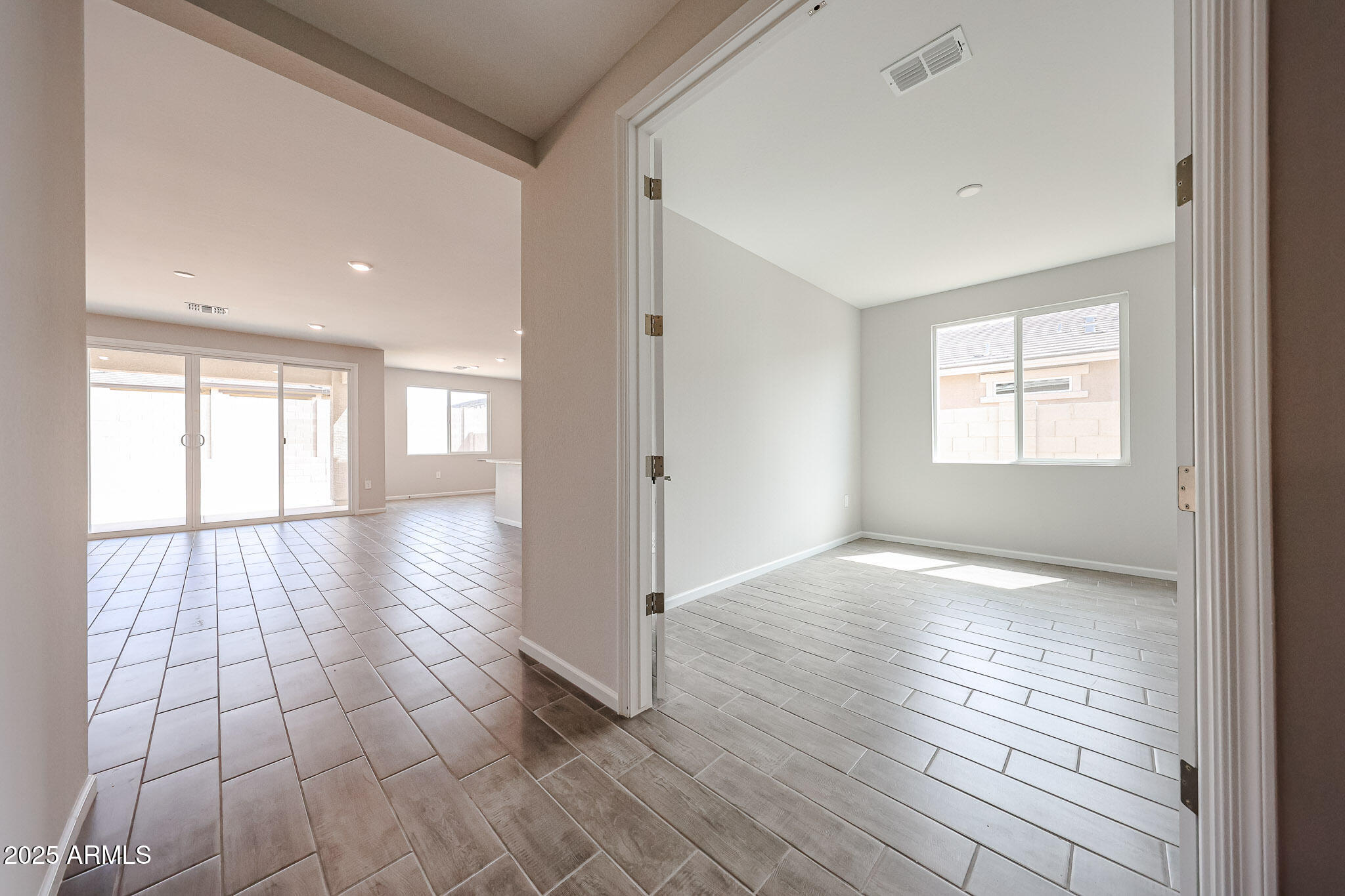 17867 West Fulton Street Goodyear, AZ 85338 - Photo 23 of 40 a view of an empty room and window