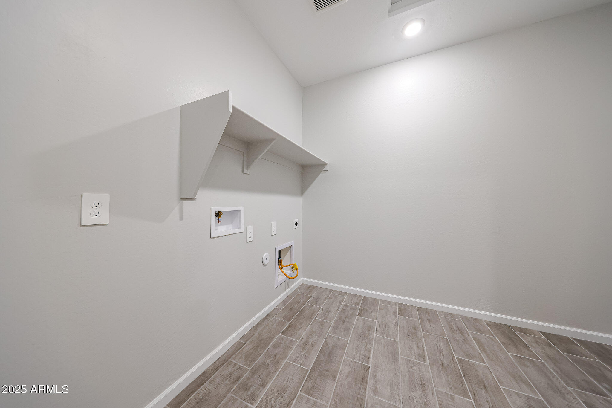 17867 West Fulton Street Goodyear, AZ 85338 - Photo 27 of 40 a view of small space with wooden floor