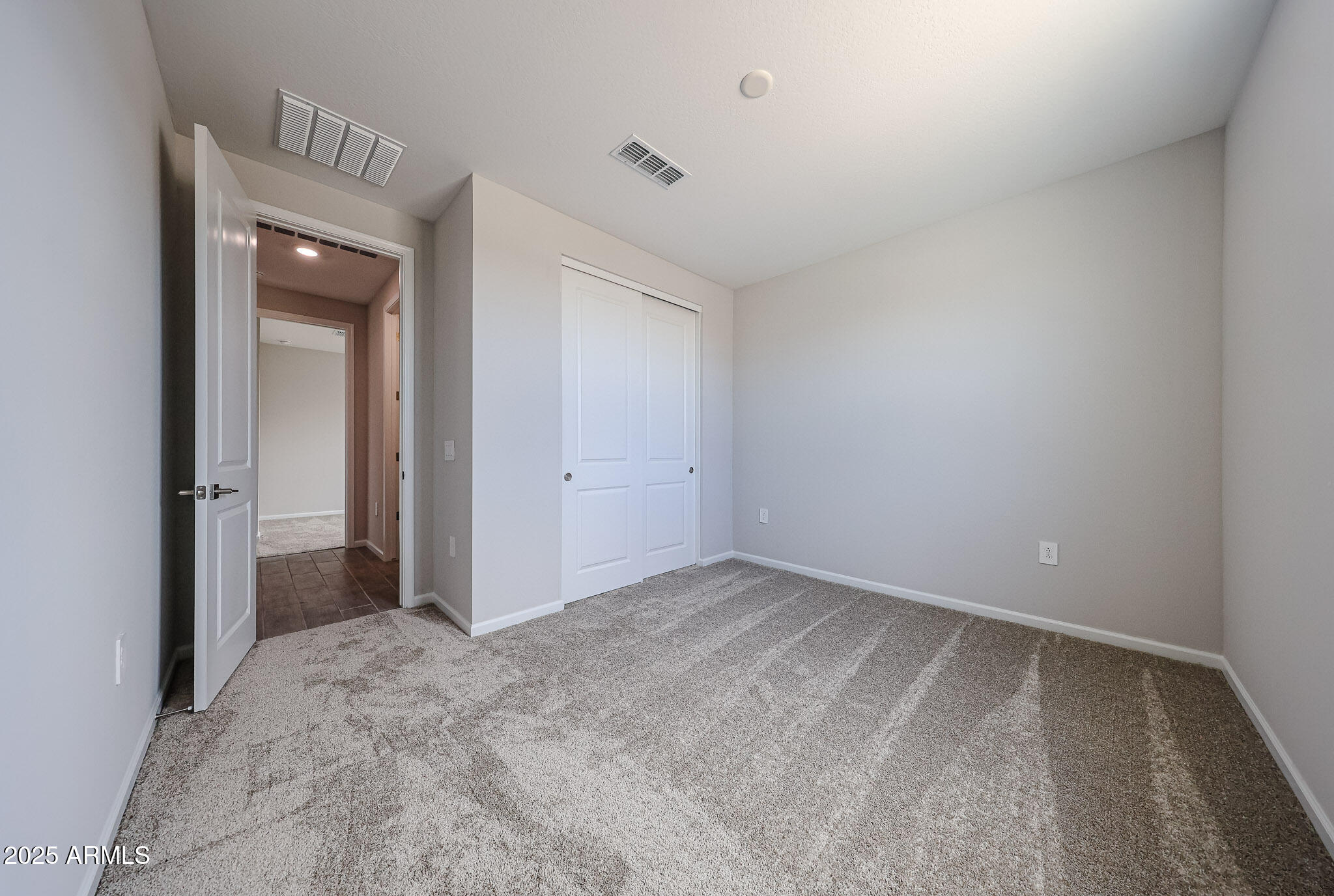 17867 West Fulton Street Goodyear, AZ 85338 - Photo 2 of 40 a view of an empty room