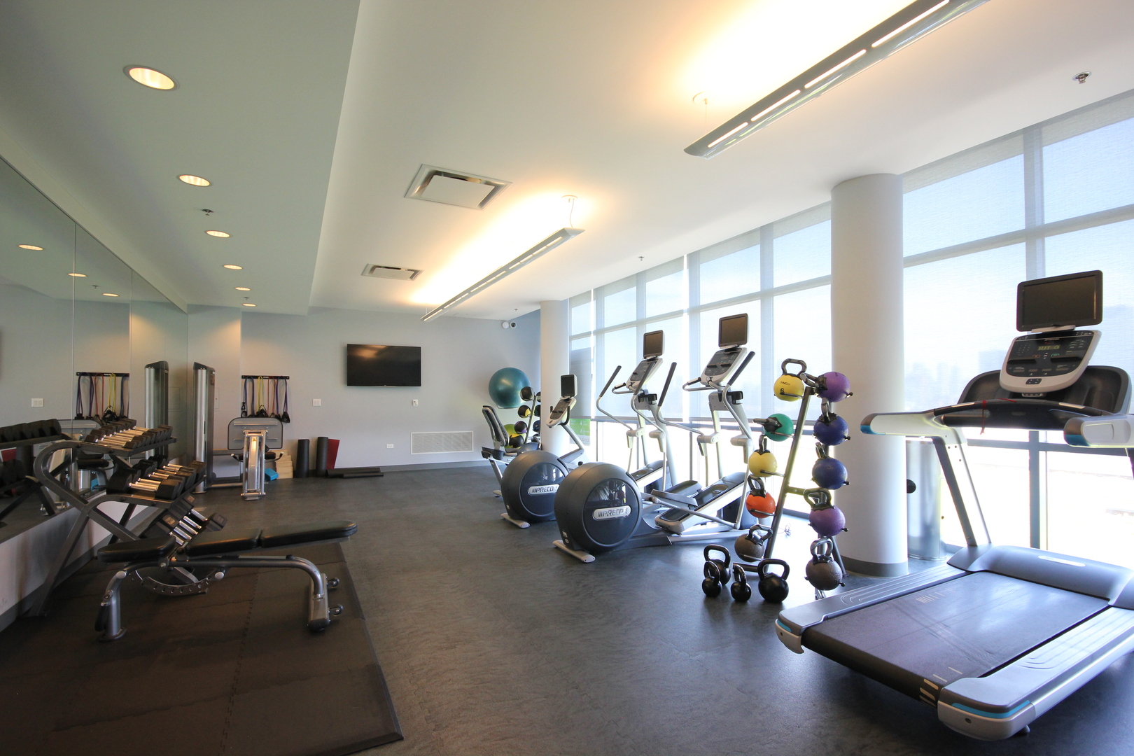 1164 West Madison Street, Unit 309 Chicago, IL 60607 - Photo 16 of 18 a view of a room with gym equipment