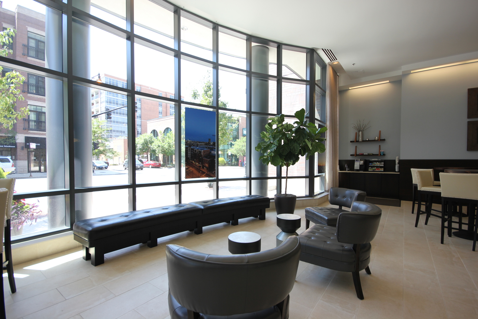 1164 West Madison Street, Unit 309 Chicago, IL 60607 - Photo 17 of 18 a living room with furniture and a potted plant
