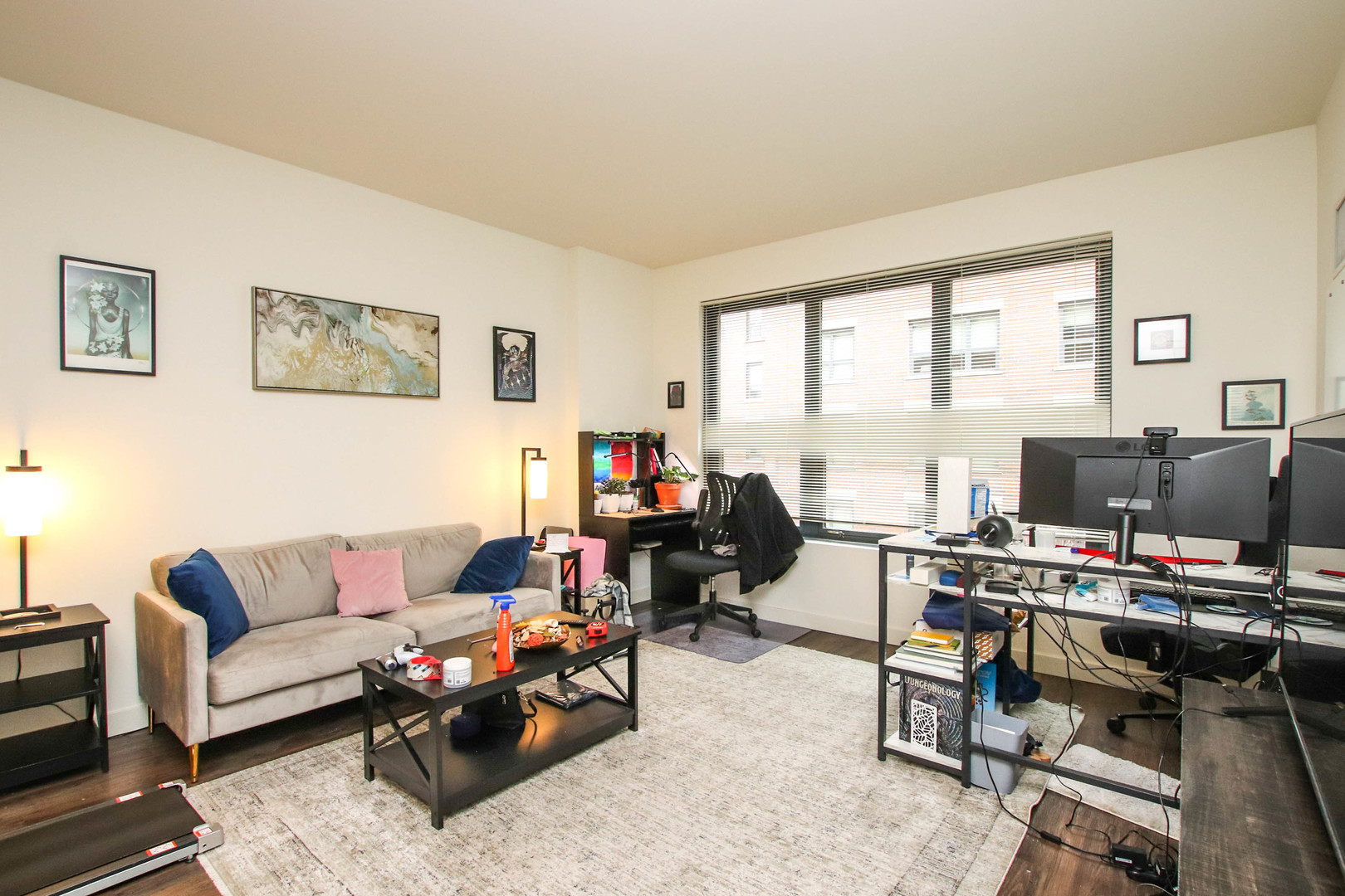 1164 West Madison Street, Unit 309 Chicago, IL 60607 - Photo 2 of 18 a living room with furniture and a large window