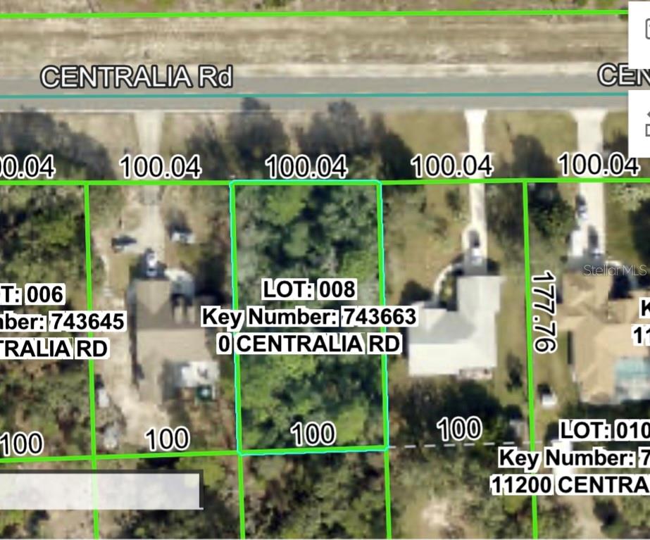 0 Centralia Road Weeki Wachee, FL 34614 - Photo 3 of 8 a sign on the side of a building