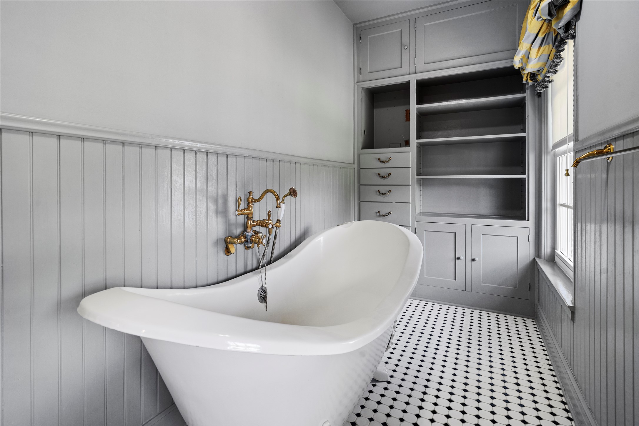 9827 FM 2759 Road Richmond, TX 77469 - Photo 27 of 50 a white bath tub sitting in a bathroom