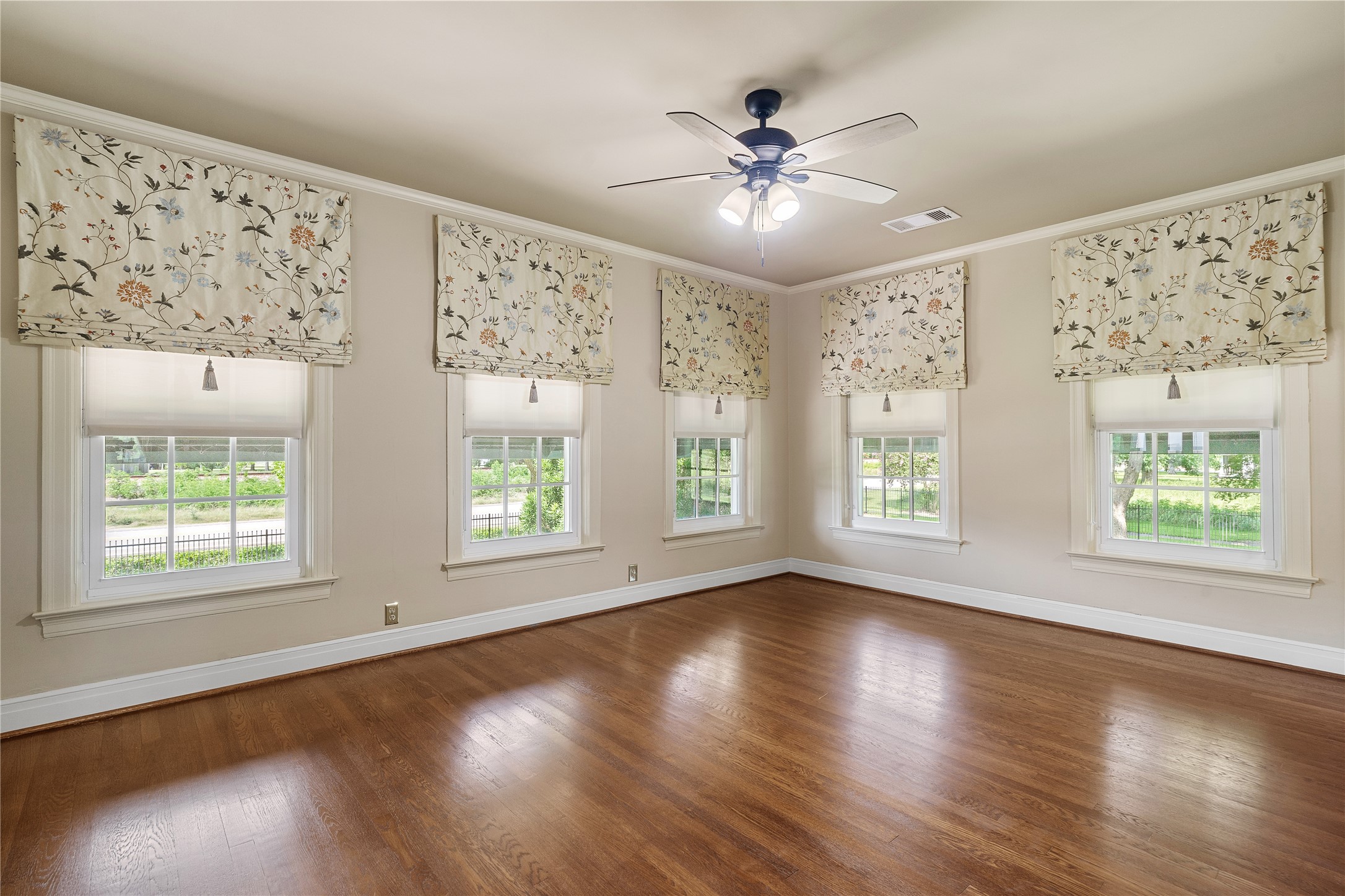 9827 FM 2759 Road Richmond, TX 77469 - Photo 33 of 50 a view of an empty room with wooden floor and a window