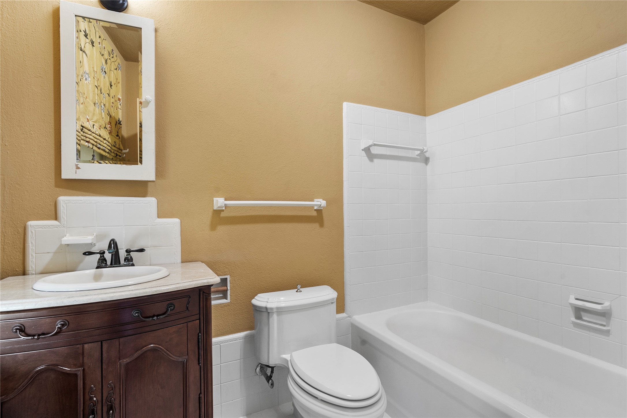 9827 FM 2759 Road Richmond, TX 77469 - Photo 35 of 50 a bathroom with a sink a toilet and shower