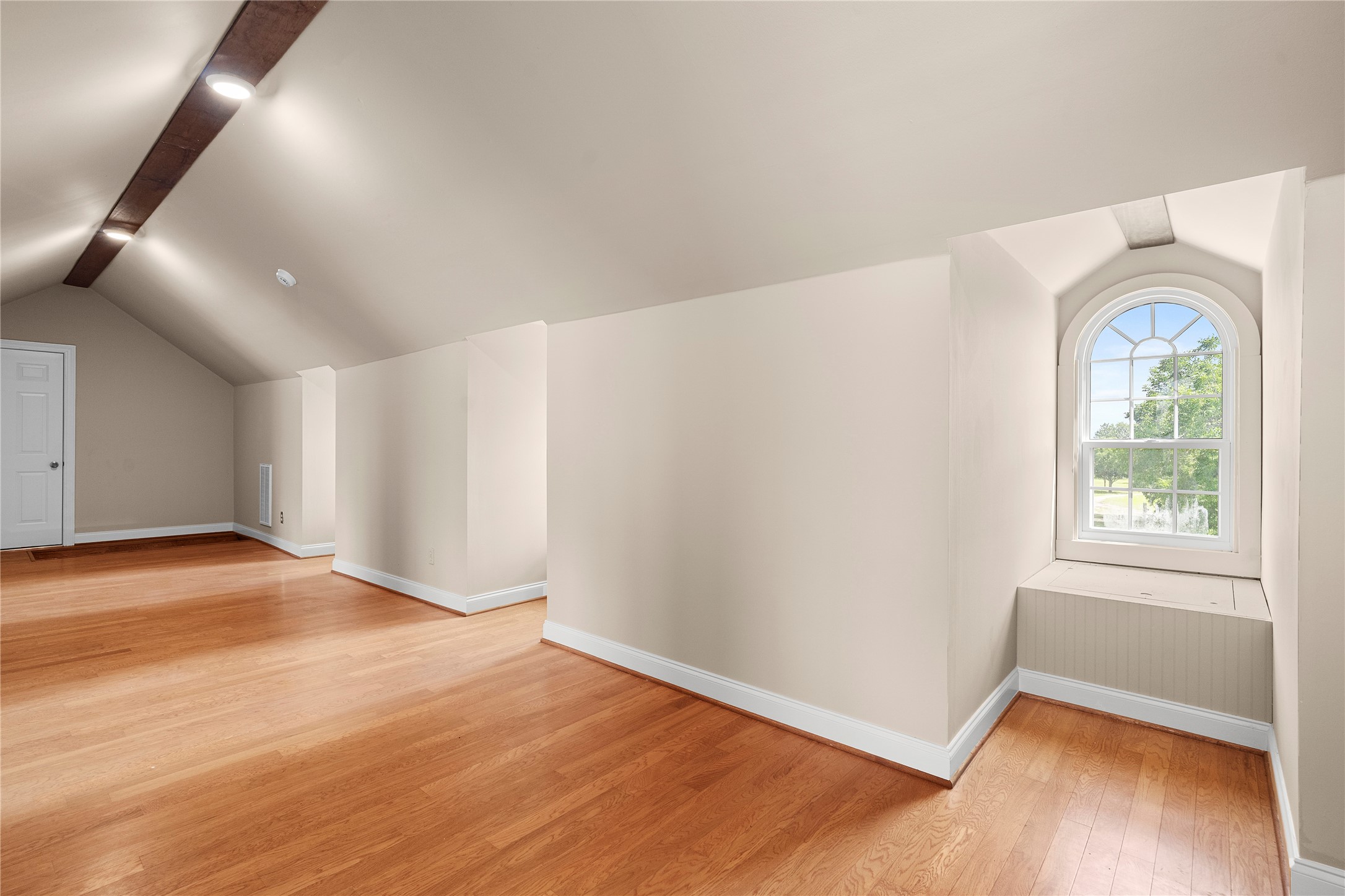 9827 FM 2759 Road Richmond, TX 77469 - Photo 37 of 50 an empty room with wooden floor and windows