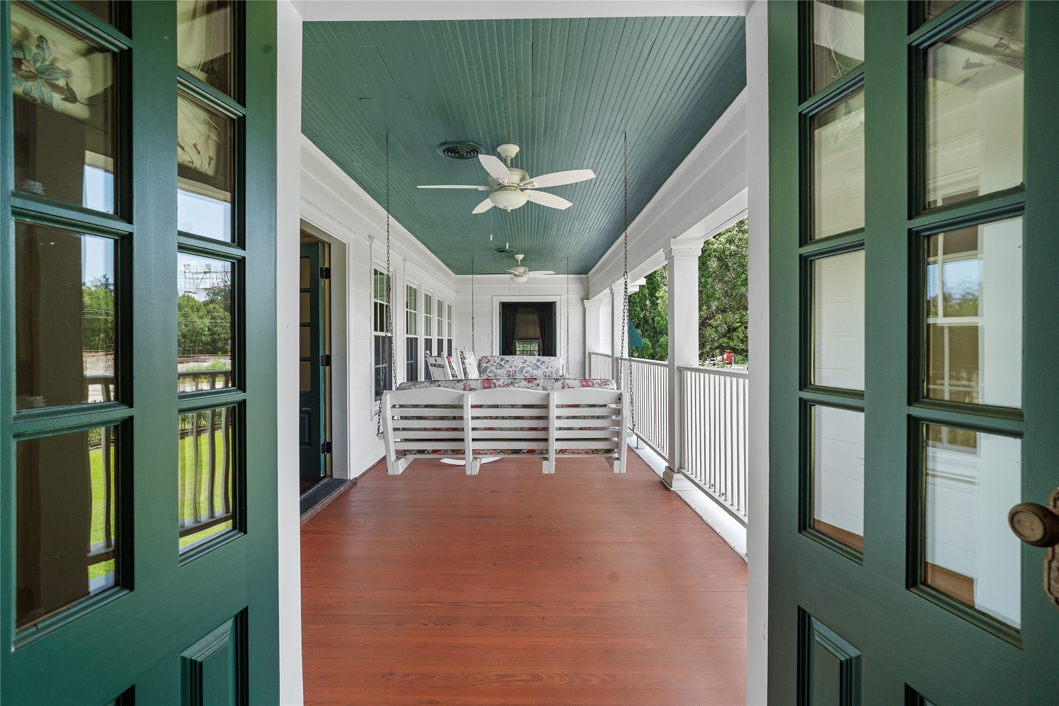 9827 FM 2759 Road Richmond, TX 77469 - Photo 38 of 50 a porch with a table and chairs