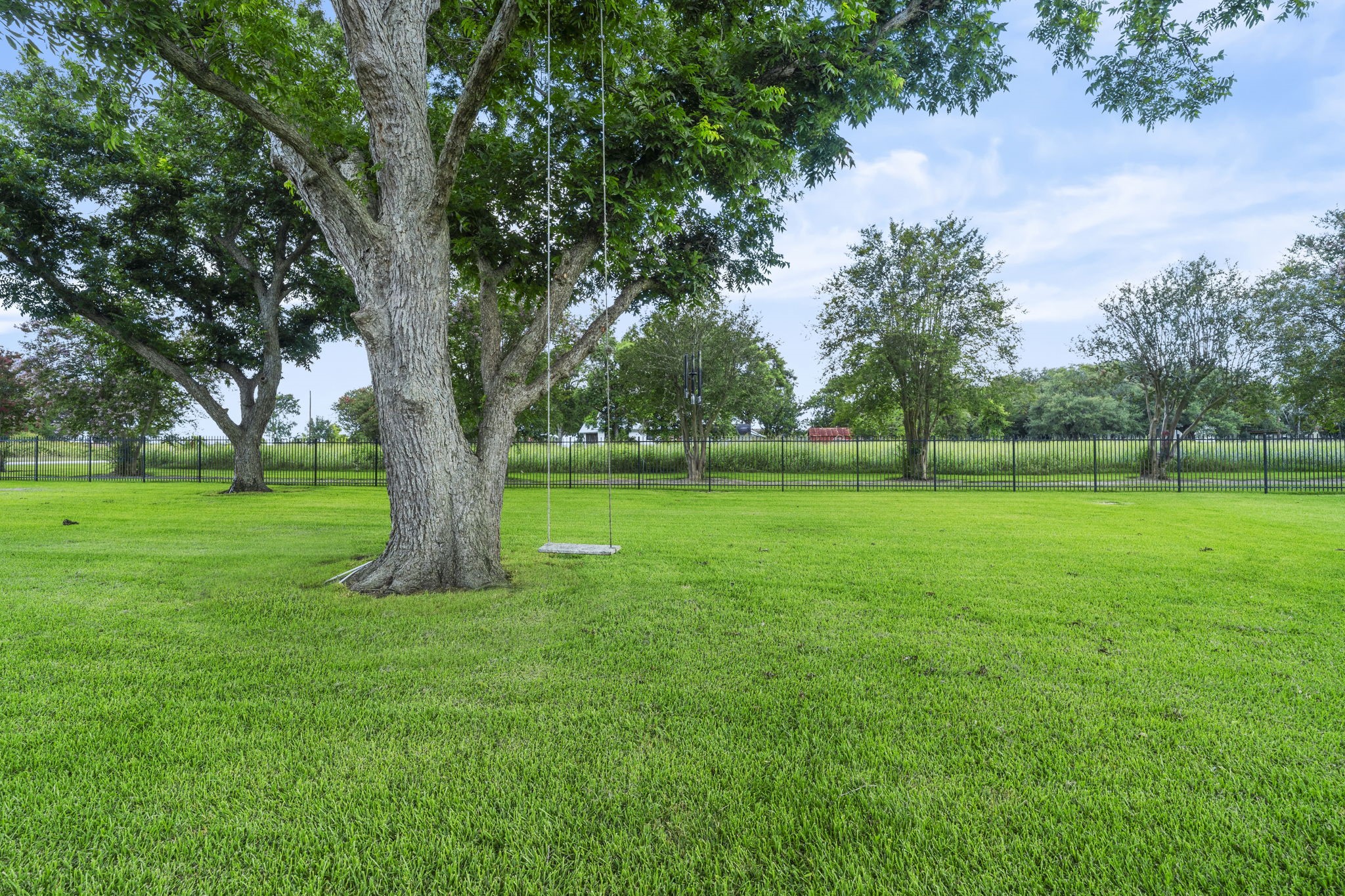 9827 FM 2759 Road Richmond, TX 77469 - Photo 46 of 50 a view of grassy field with benches