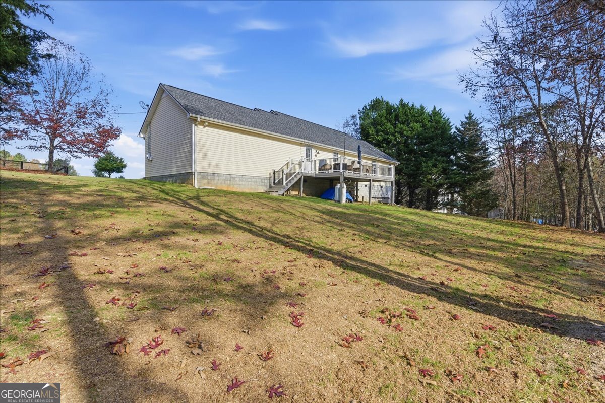 1111 Old Collard Valley Road Aragon, GA 30104 - Photo 29 of 38 a house with trees in front of it