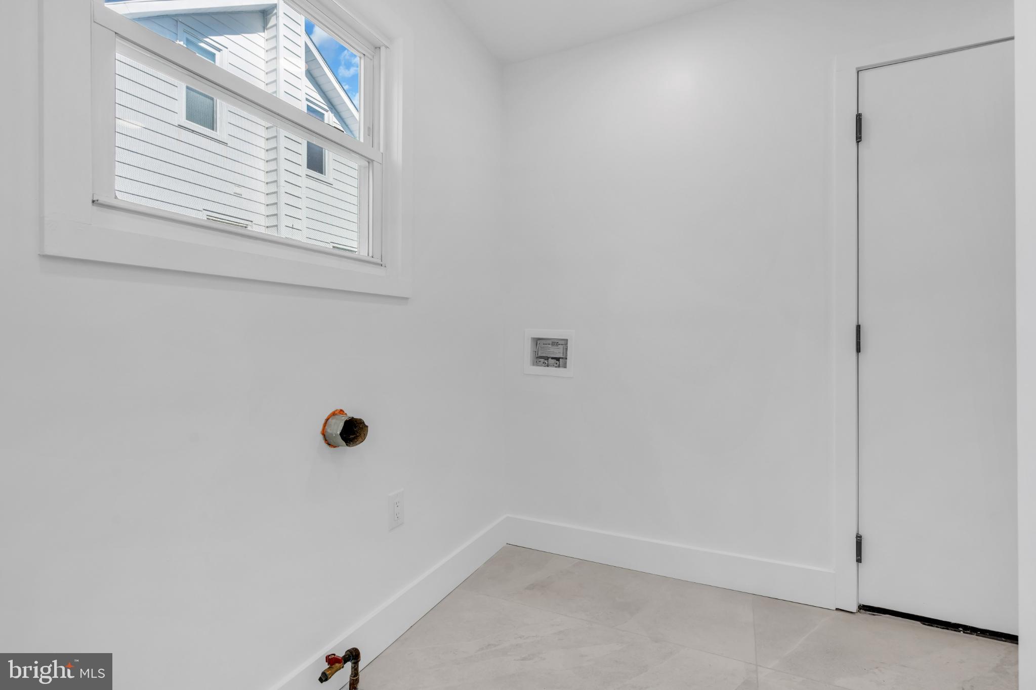 104 East Laurelton Avenue Maple Shade, NJ 08052 - Photo 13 of 37 a view of an empty room with a window